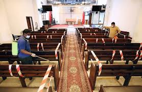 Kuwait churches postpone reopening